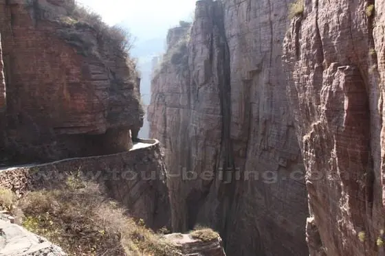 the picturesque Grand Canyon with Red Steep Cliff.